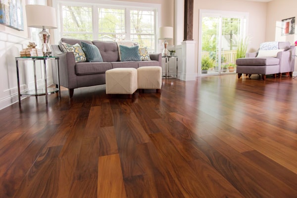 engineered hardwood in a living room with a gray couch