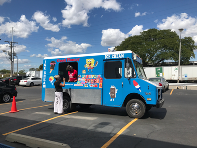 ice cream truck delivers treats for employees